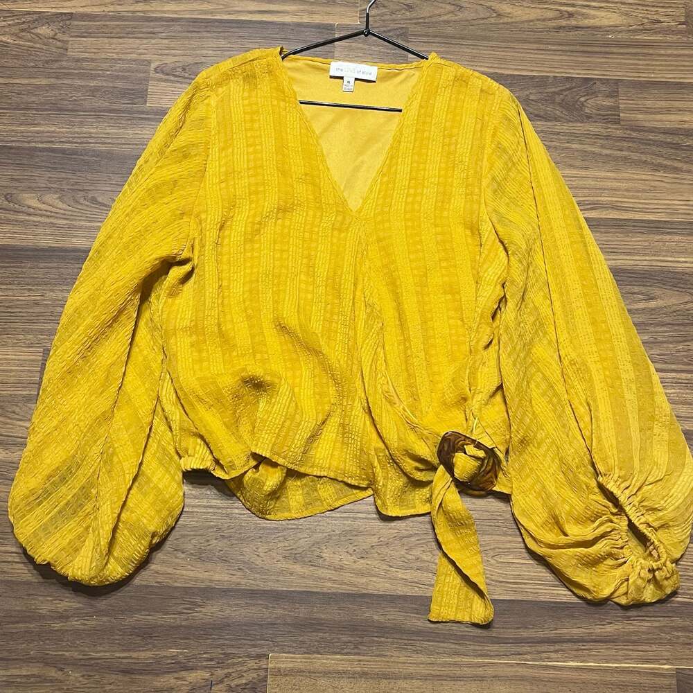 The Line of Style Mustard Yellow Textured Wrap Blouse with O-Ring Detail and Puf